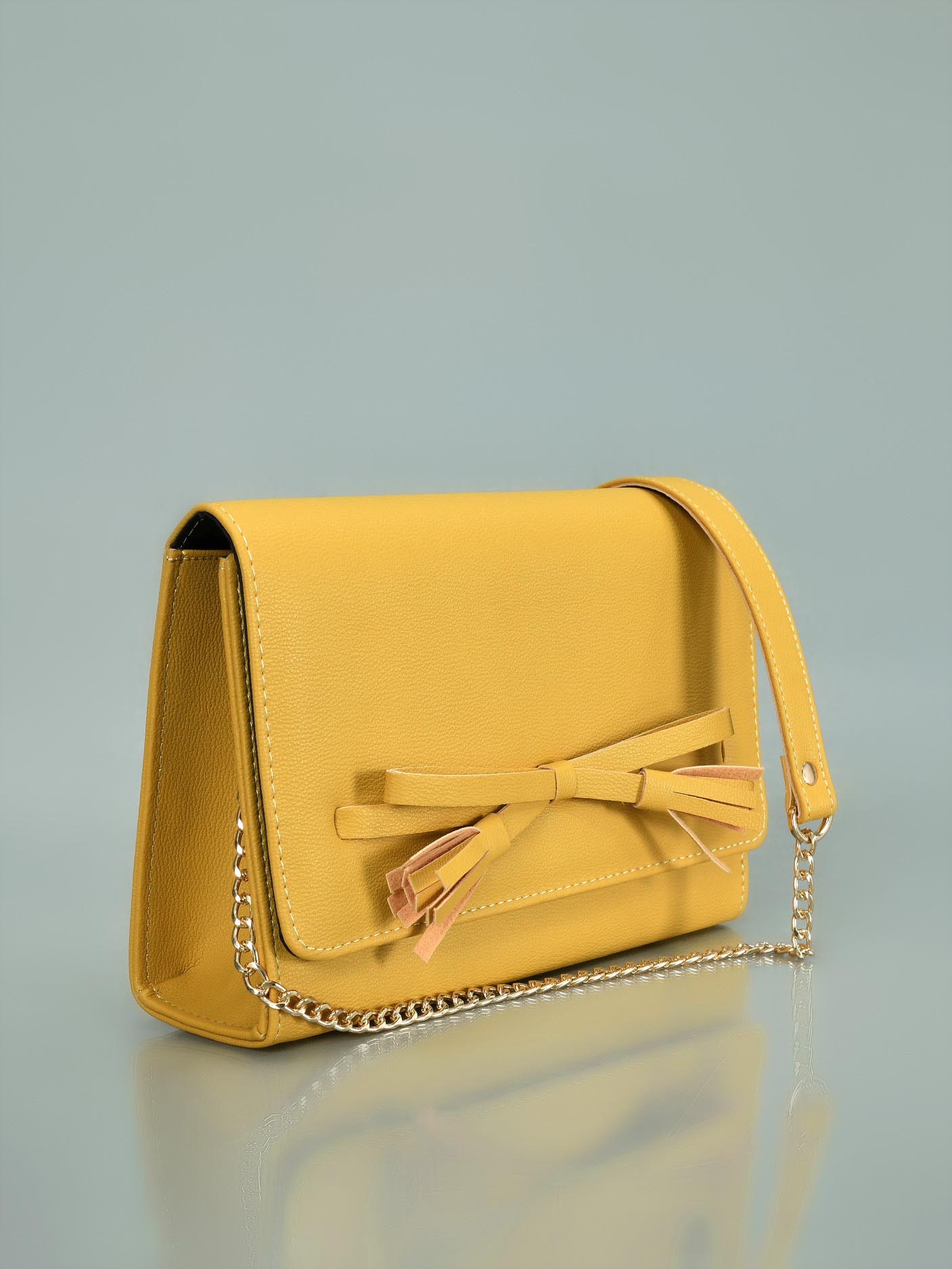 Limelight - Bow Detail Clutch