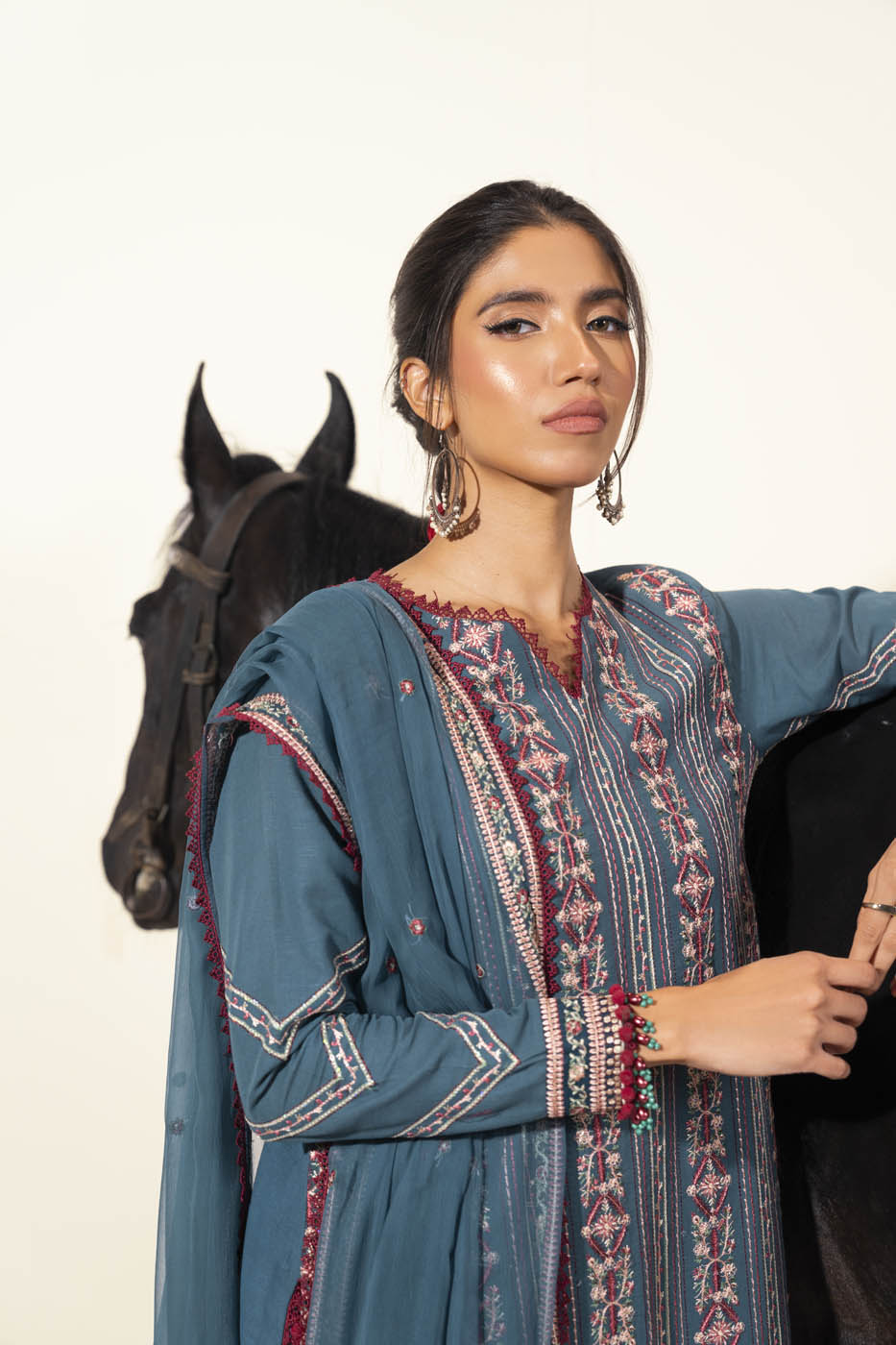 Three Piece Embroidered Khaddar Suit With Bamber Dupatta